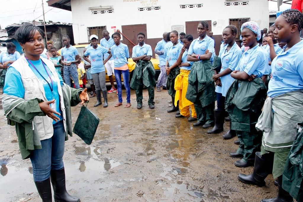 Australia Award Alumna Hawa Page conducting training as part of the Adolescents Leading Intensive Fight Against Ebola program in Liberia